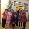 Karin and ladies in front of Christmas tree